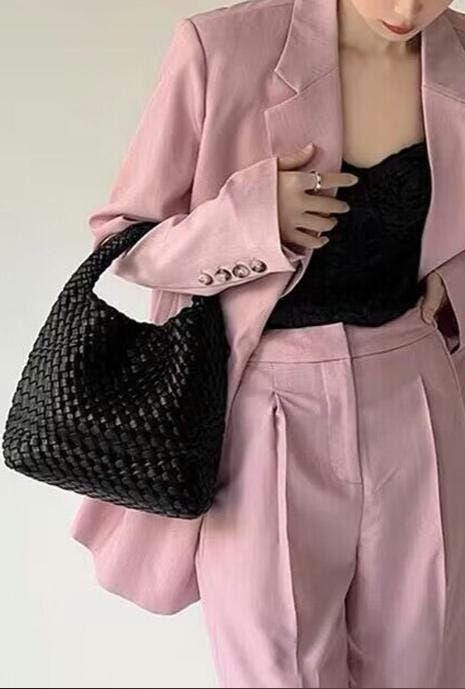 It's Official: Our Luxe. Cruelty Free Weave Tote with pochette is trending this season. Essential. Perfection. In Basic Black. Only 3 left!