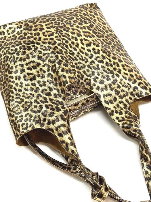 The Pussycat Tote. Soft Premium Leather meets Animal Print for the perfect blend of Function, Form and Fun. Small “Pouchette” included.