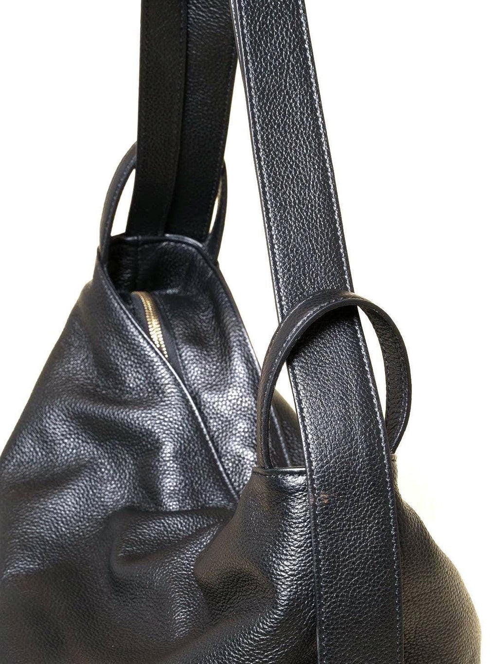 Is it a Backpack? A Shoulder Bag? It's a convertible Italian leather backpack. Free Shipping.