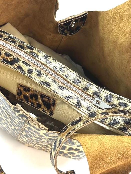 The Pussycat Tote. Soft Premium Leather meets Animal Print for the perfect blend of Function, Form and Fun. Small “Pouchette” included.