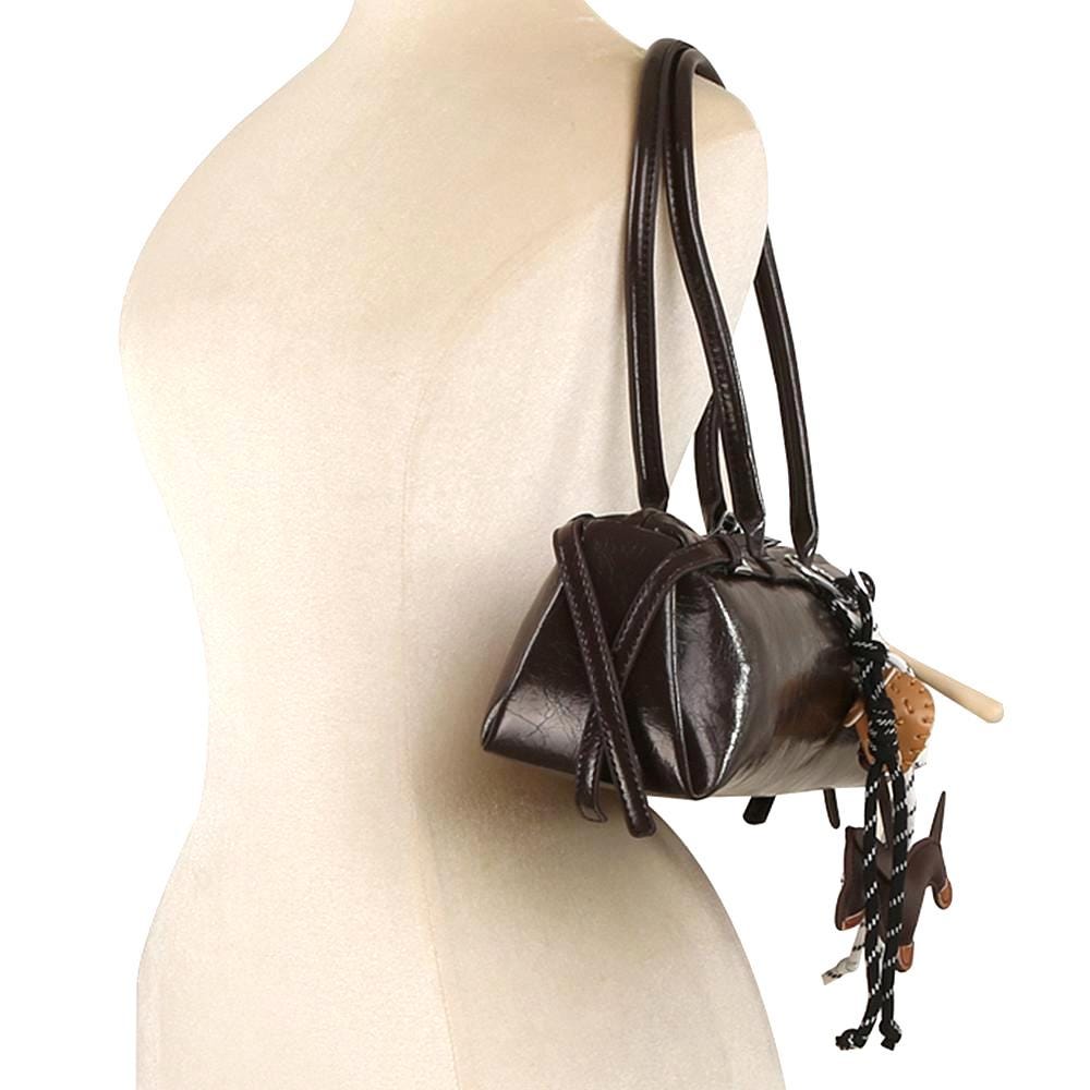 Elongated Shoulder Bag with Removable Bag Charm and Silver Tone Hardware